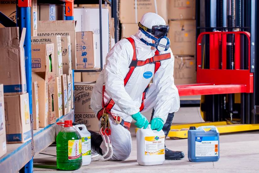 A janitor in personal protective equipment