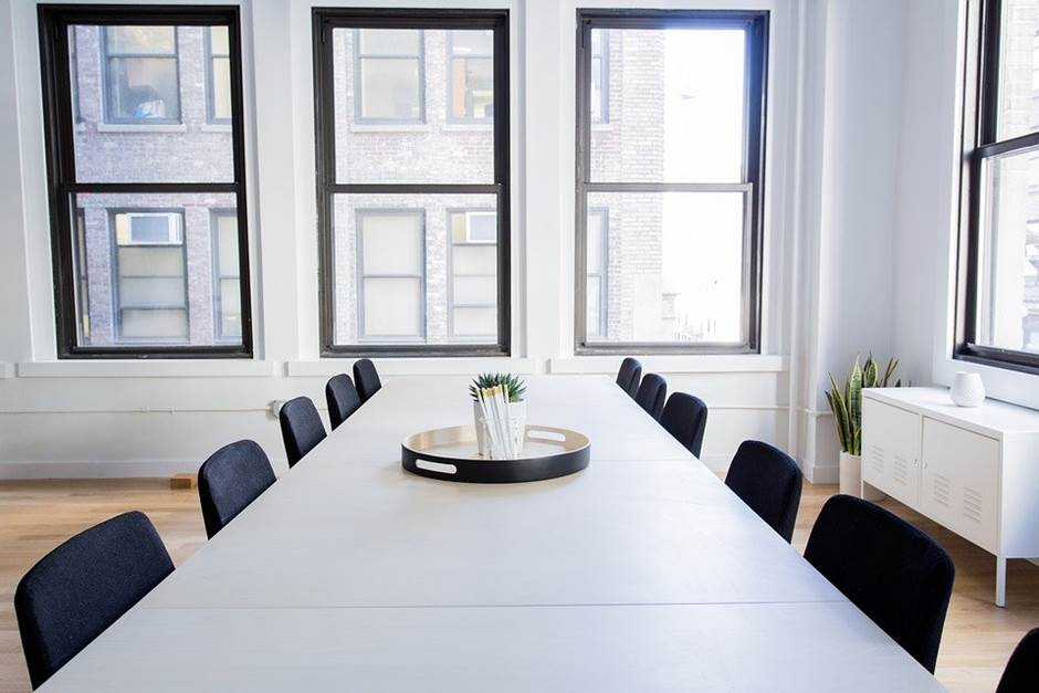 A clean and tidy meeting table in an office
