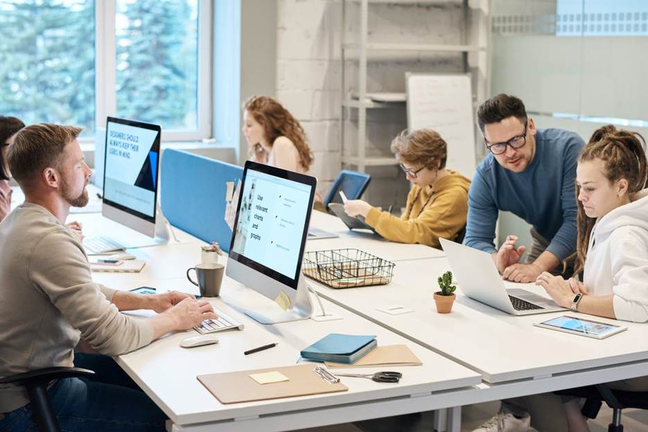 people working in an office with motivation 