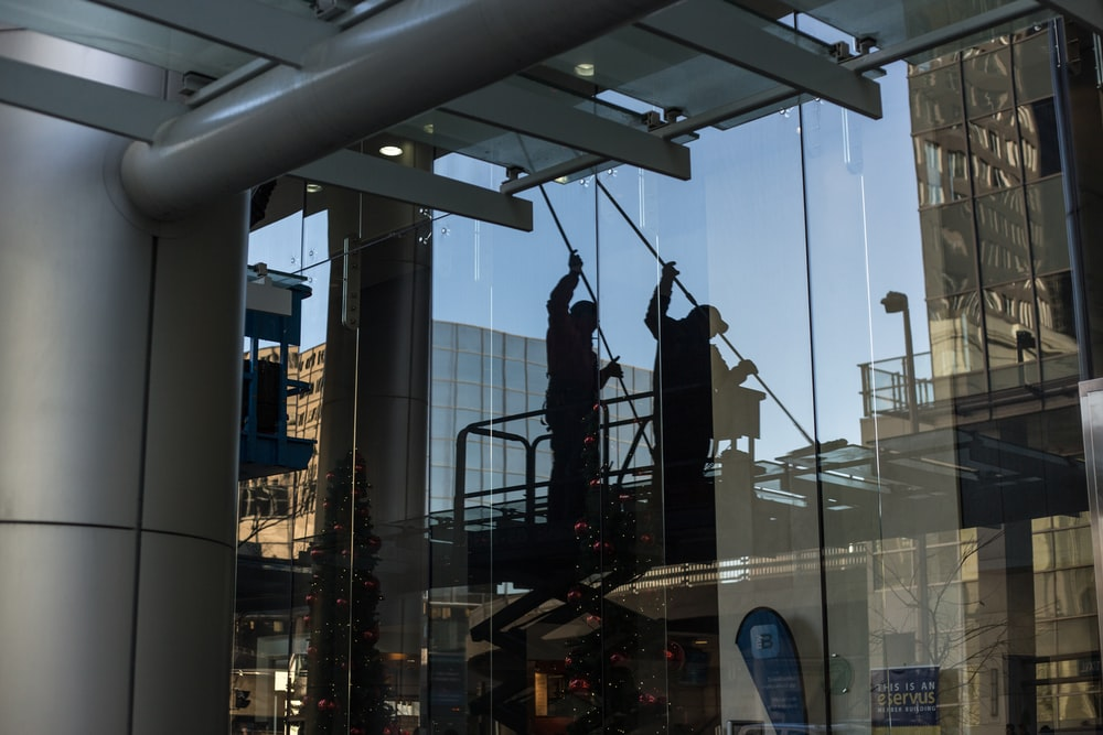 A window washer cleaning windows of a building