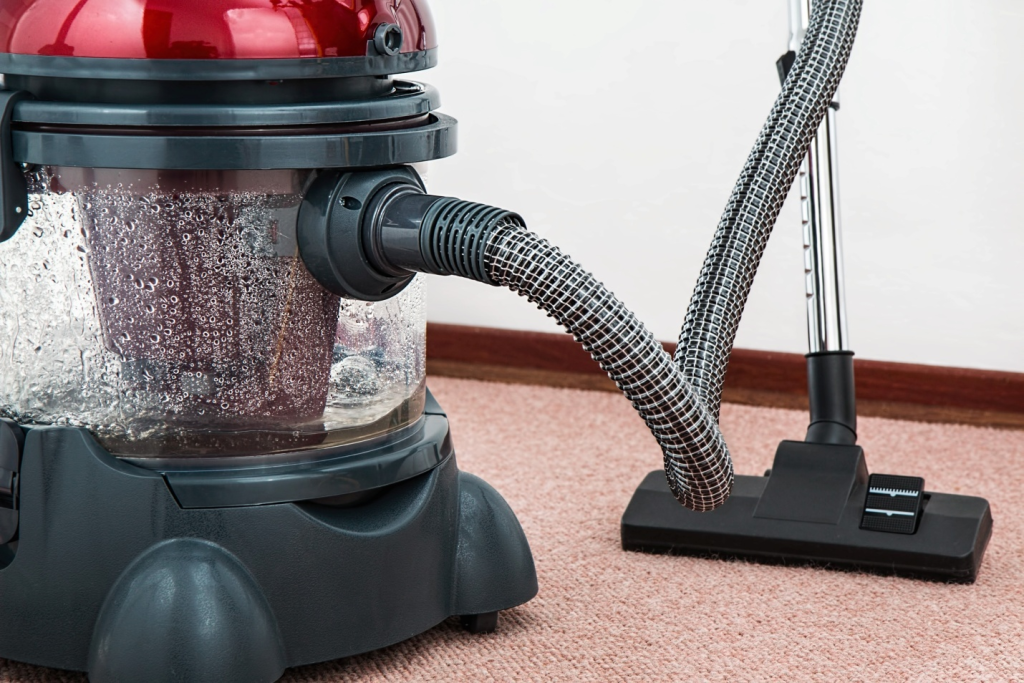 Hot water extraction equipment used for commercial carpet cleaning