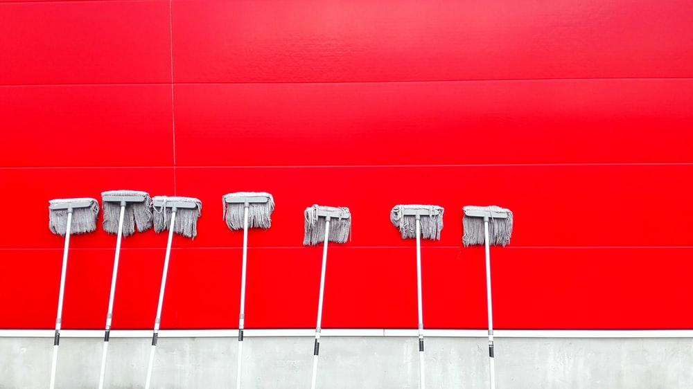 Janitorial cleaning services in KC cleaning a wall