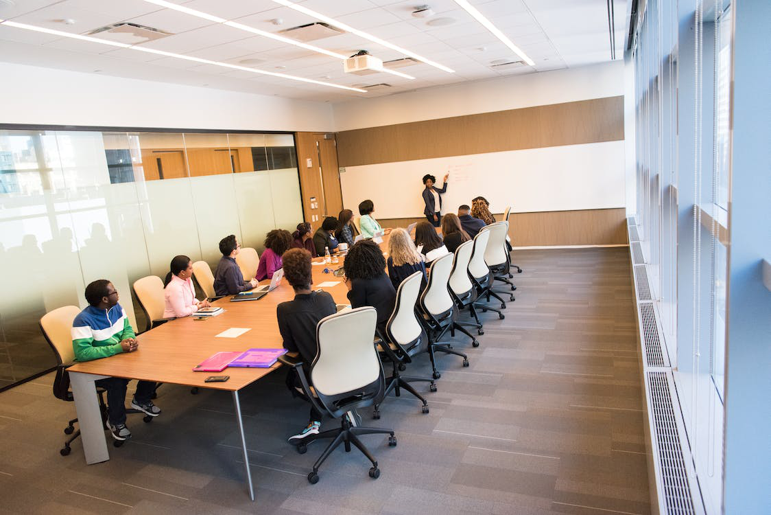 Government employees having a meeting in a conference room