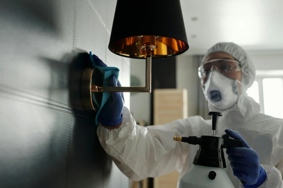 A person using professional-grade cleaning products