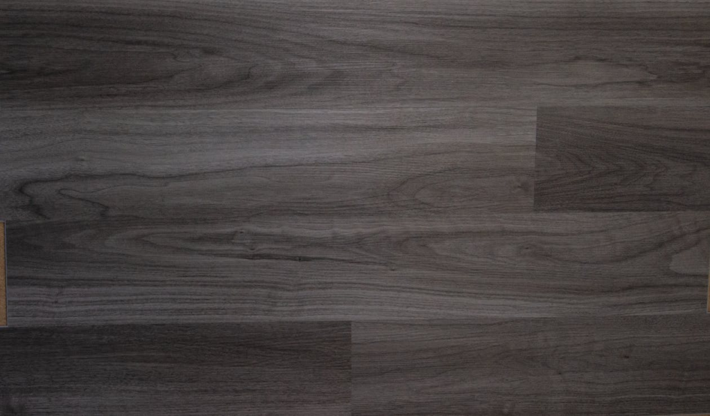 Dark brown wood flooring.