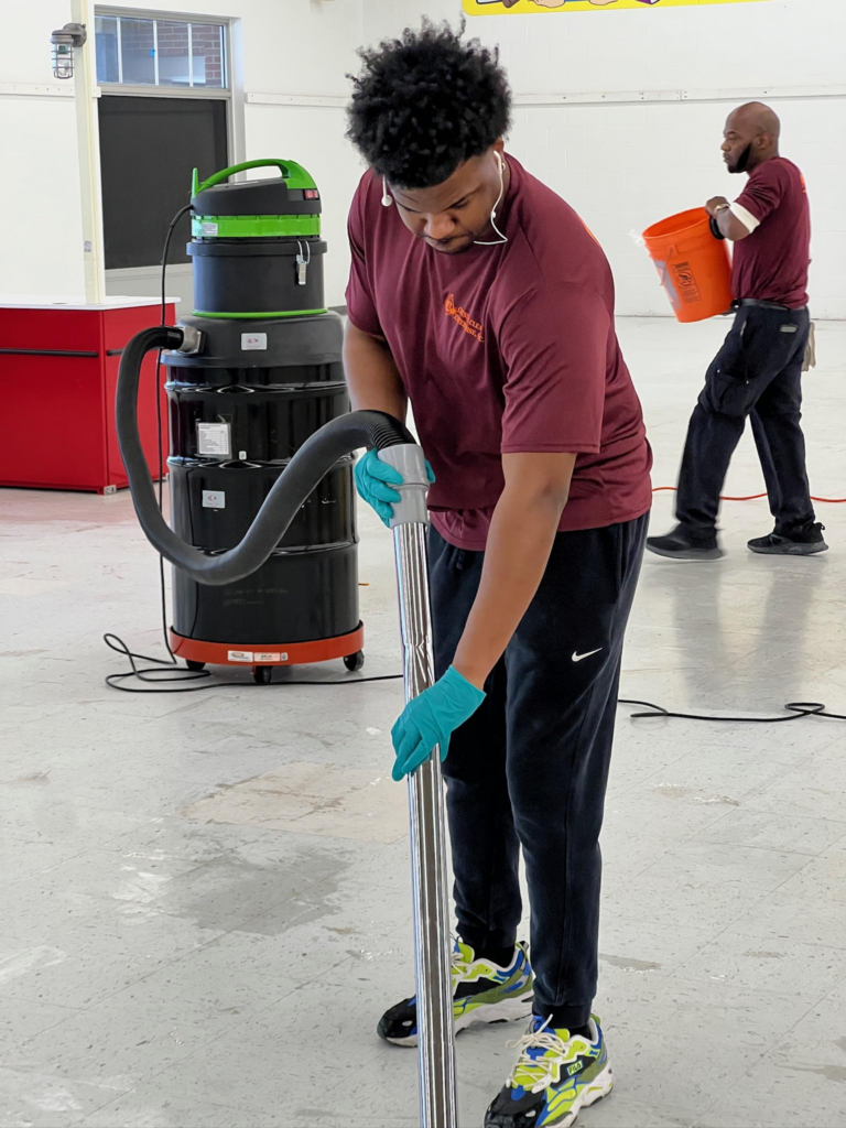 a person cleaning up a high-touch surface