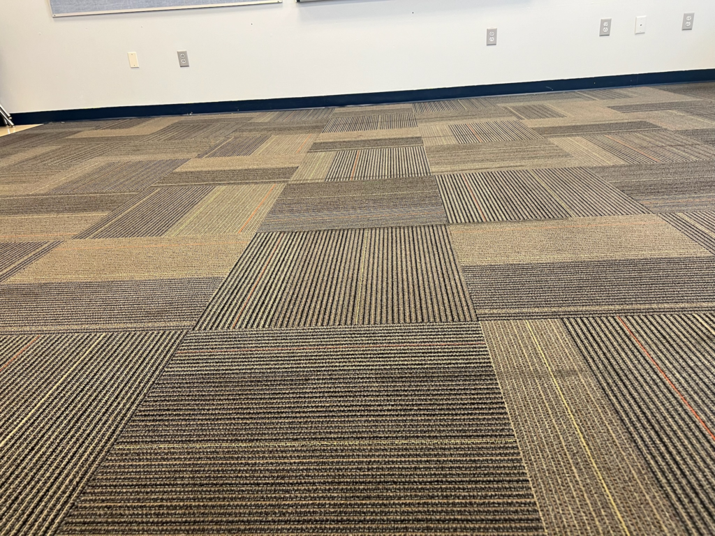 close-up of a carpeted floor in a meeting room of an office space
