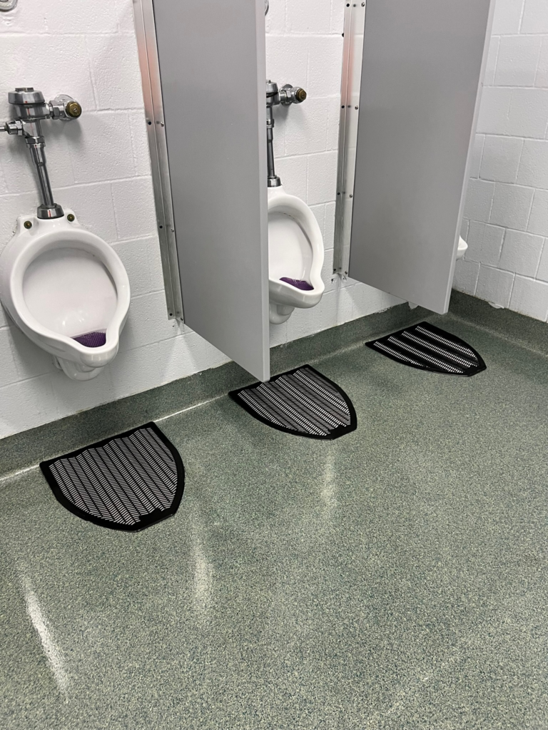 close-up of washroom stalls in an office space
