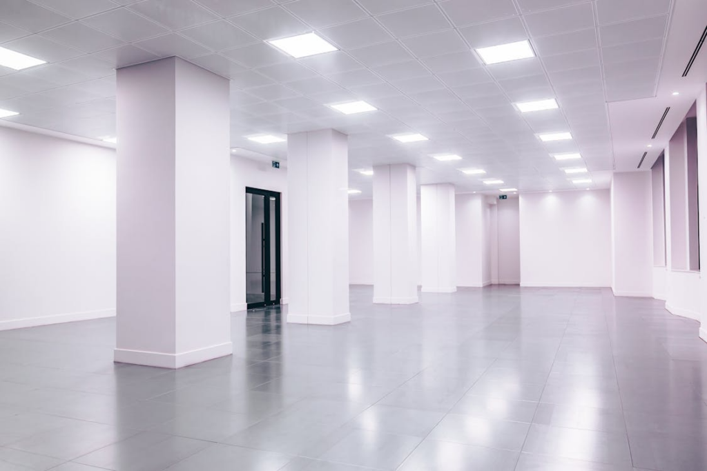 Large commercial space with clean, polished floors and bright lighting