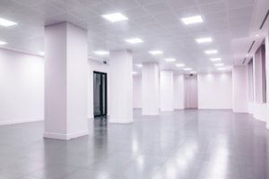 Large commercial space with clean, polished floors and bright lighting